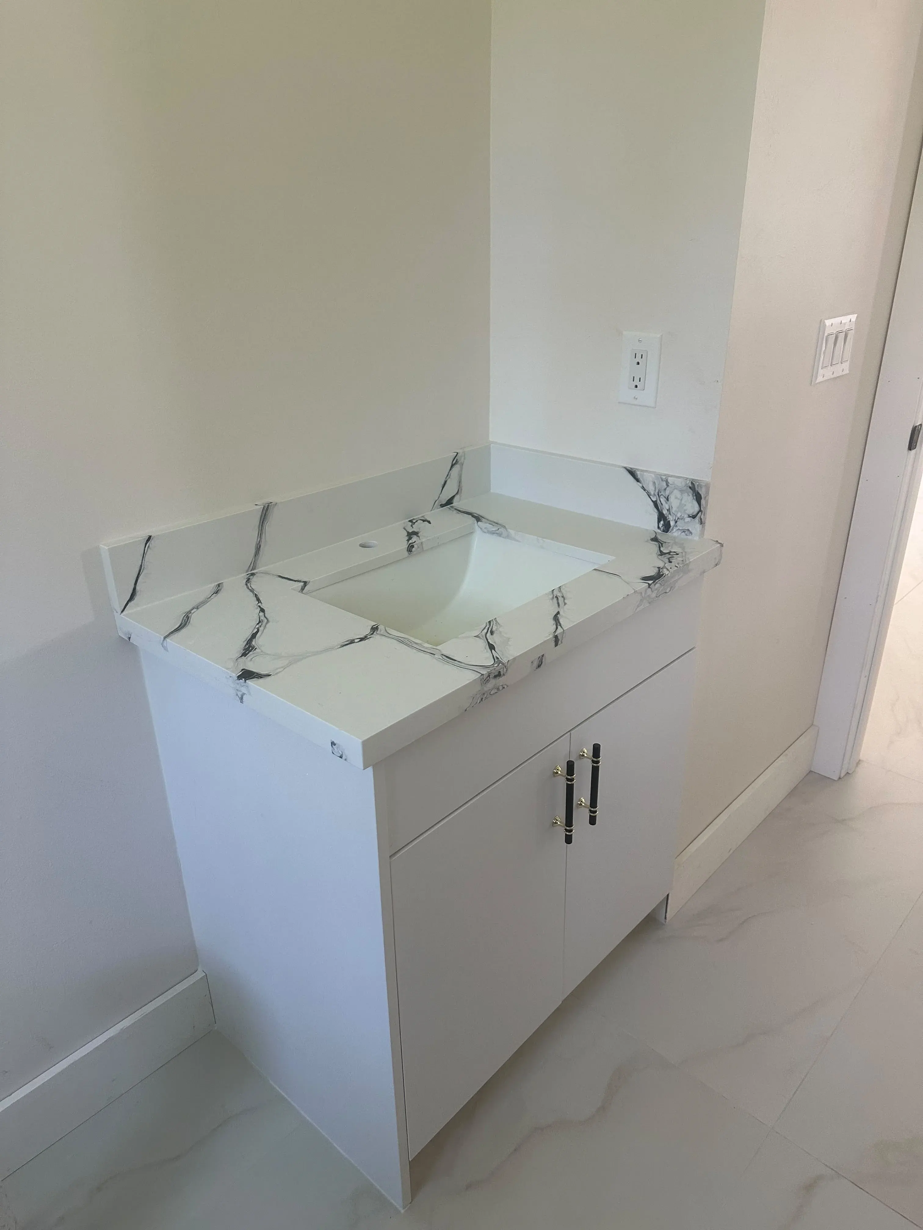 Bathroom vanity with a marble countertop